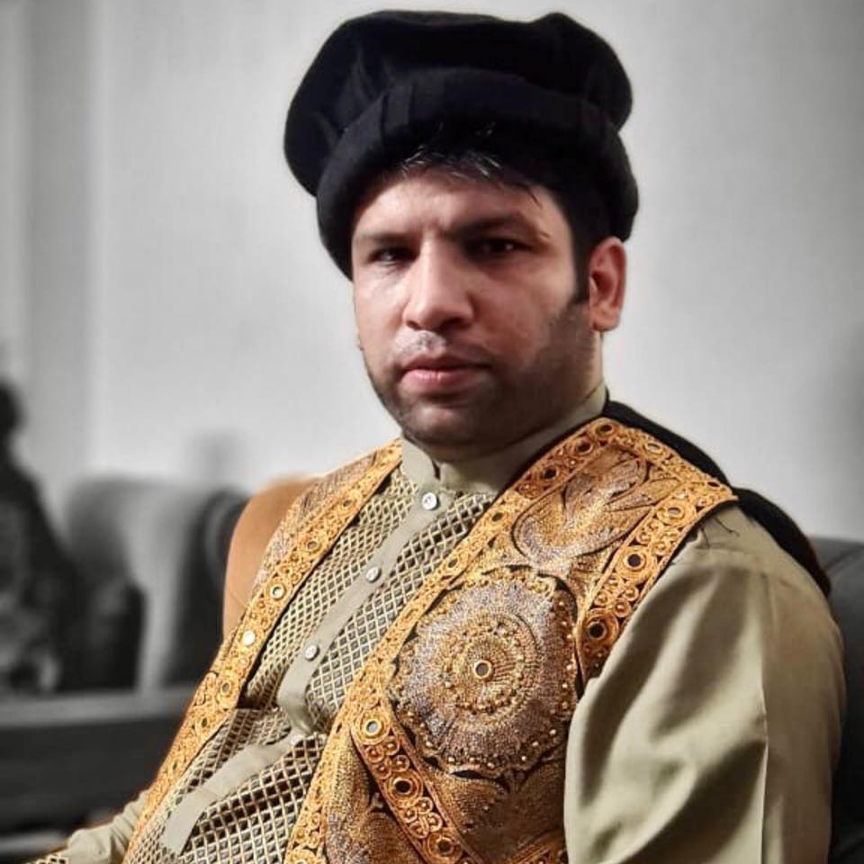 Adib in traditional Afghan dress